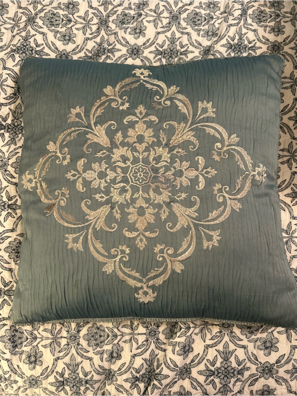 Decorative Teal Throw Pillow with Embroidered Medallion